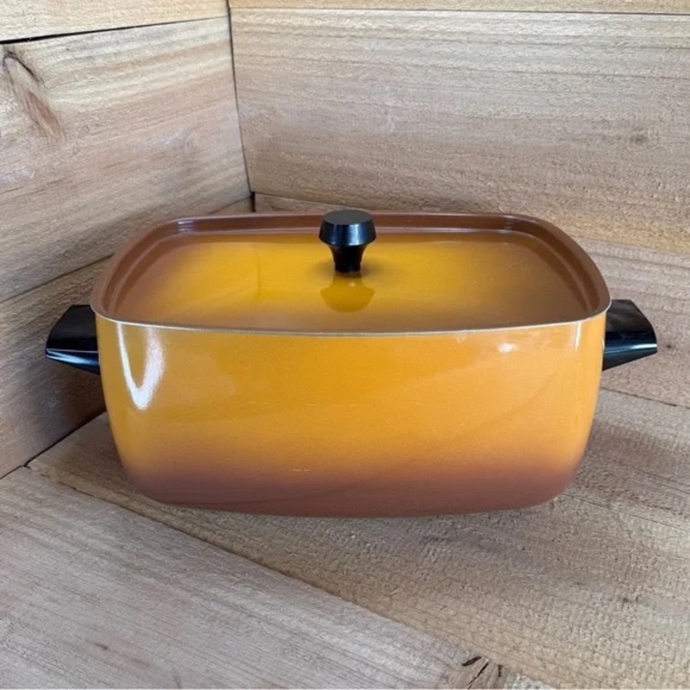 Vibrant Yellow and Brown Cast Iron Casserole